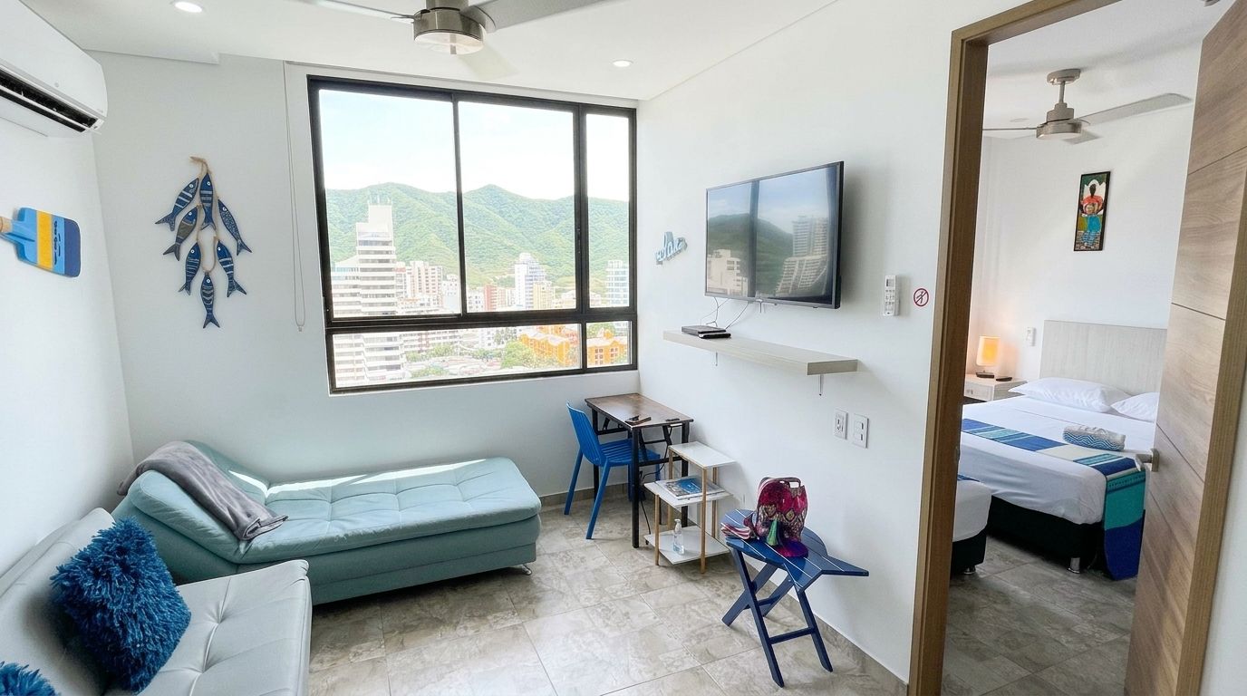 Bright living room and open kitchen in an El Rodadero Santa Marta beach-view apartment rental